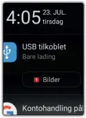  ??  ?? 1 Når kabelen er tilkoblet, velger du Bilder 1 i varslingen du ser på telefonen.