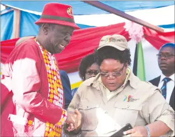  ??  ?? “We don’t want to be sucked into those battles of the past, as we try to settle for this grand coalition,” NPP leader Joice Mujuru seems to be saying to her MDC-T counterpar­t Morgan Tsvangirai in this file picture