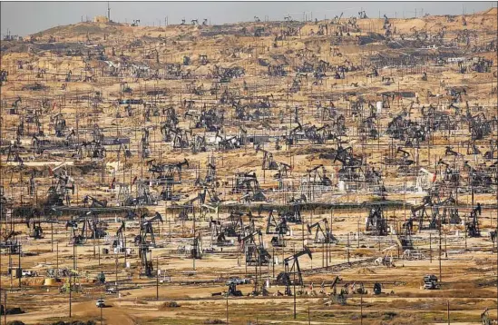  ?? Al Seib Los Angeles Times ?? GOV. GAVIN NEWSOM says he will announce a detailed strategy on energy policy in the next few weeks. Above, pumpjacks fill Oildale in north Bakersfiel­d in 2016.