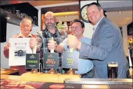  ??  ?? Market Bosworth Brewery head brewer Jon Skinner, centre left, and director Rich Brine, right, receive an award from Hinckley and Bosworth Camra branch chairman David Finn, left, and Hinckley Beer Festival 2017 organiser Chris James, centre right, at...