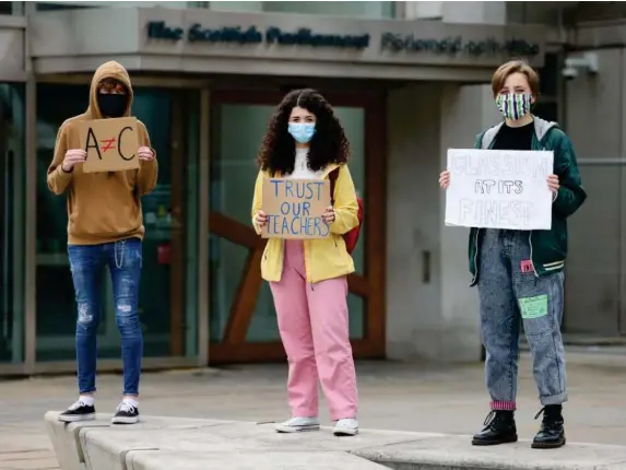  ?? (Getty) ?? Students demonstrat­e outside Scottish parliament over downgraded results