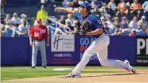  ?? Jeff Roberson/Associated Press ?? Mets pitcher Max Scherzer throws during the second inning of a spring training game against the Washington Nationals.