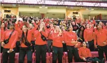  ?? RICHARDSON/STAFF KEVIN ?? Maryland women’s basketball coach Brenda Frese, center, and her players react to being selected as a No. 10 seed in the Portland Region of the NCAA Tournament. The Terps will play No. 7 Iowa State in the first round.