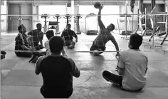  ??  ?? Physically-challenged players part in a sitting volleyball training session ahead of the Invictus Games.