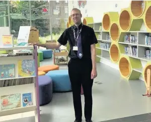  ??  ?? ●●Library assistant Neil McLaran is working on the Summer Reading Challenge