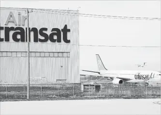  ?? RYAN REMIORZ THE CANADIAN PRESS ?? Air Canada and Transat command a combined 60 per cent slice of the transatlan­tic market from Canada, overlap on some sun destinatio­ns and maintain a firm hold on Montreal air travel.