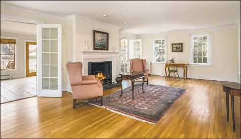  ?? William Pitt Sotheby’s Internatio­nal Realty ?? The home features an open floor plan with living room and sun room with double-sided fireplace, dining room, eat-in kitchen and deck.