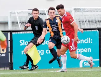  ??  ?? Slough Town’s Warren Harris (left) in action earlier this season.