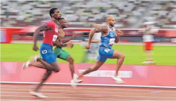  ?? FOTO: YOHEI OSADA/IMAGO IMAGES ?? Der Olympiasie­ger über die kürzere Sprintdist­anz heißt Lamont Marcell Jacobs (re.).