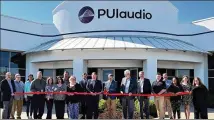  ?? CONTRIBUTE­D ?? City and county officials and members of sound design and distributi­on company PUI Audio cut the ribbon on the company’s new Fairborn location Monday.