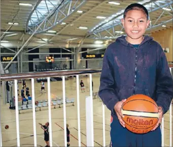  ?? Photo: JAMES GREENLAND ?? Impressive effort: Petelo Louis Leaupepe, 12, of Grenada North has been selected for the New Zealand under-14 basketball team after he persevered on the bench as a Wellington rookie.