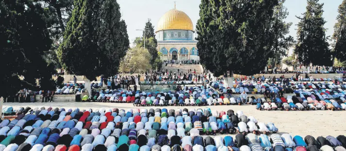  ??  ?? Palestinia­n Muslims pray inside the Haram al-Sharif compound, known to Jews as the Temple Mount, in the old city of Jerusalem.