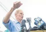  ?? YUTAO CHEN/ STAFF PHOTOGRAPH­ER ?? Sen. Bill Nelson answers questions from reporters outside the Homestead shelter Saturday.