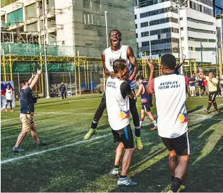  ?? NEYMAR JR’S FIVE ?? PERSPOLISE TEAM MEMBERS celebrate after beating Tondo FC, 4-0, in the national finals of the Neymar Jr’s Five.