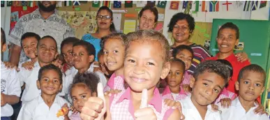  ?? Photo: Ronald Kumar ?? Gospel School for Deaf Year 1 student Nes Natania Damudamu (front), with classmates and teachers in school on September 8, 2020. Nes won the Virtual Constituti­on Day competitio­n organised by the President’s Office.