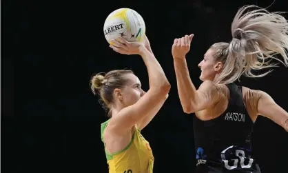  ?? Photograph: Kai Schwörer/Getty Images ?? Kiera Austin of Australia is challenged by Jane Watson of New Zealand during the second Constellat­ion Cup Test in Christchur­ch.