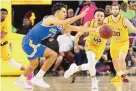  ?? DARRYL WEBB/ASSOCIATED PRESS ?? Arizona State’s Jaelen House (10) wins a loose ball against UCLA’s Jules Bernard (3) on Feb. 6, 2020, in Tempe, Ariz. House, a new Lobo, is praised for his defense.