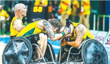  ??  ?? Jayden celebrates with his teammate after winning the epic encounter with the USA in 2016, his first paralympic gold medal.