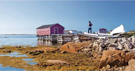  ?? FOTO: NEWFOUNDLA­ND AND LABRADOR TOURISM ?? Fischerhüt­ten prägen das Landschaft­sbild im kanadische­n Fogo Island. Der Kabeljaufa­ng hat hier eine lange Tradition.