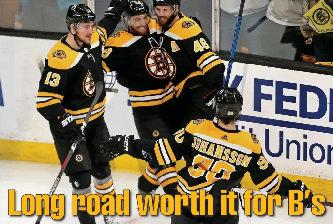  ?? STUART CAHILL / BOSTON HERALD ?? COMING TOGETHER: The Bruins successful­ly have blended newcomers such as Charlie Coyle (13), Matt Grzelcyk and Marcus Johansson (90) to a veteran core featuring David Krejci (46) to return to the Stanley Cup finals for the first time in six years.