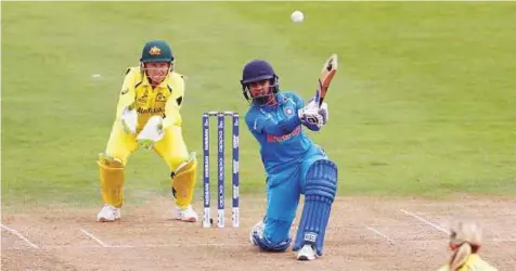  ?? Reuters ?? Mithali Raj in action during yesterday’s group stage match of the Women’s World Cup against Australia. Her valiant effort, however, was not enough as the defending champions overhauled the Indian total of 226 for seven wickets.