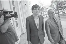  ?? DREW ANGERER, GETTY IMAGES ?? Martin Shkreli, center, and attorney Benjamin Brafman arrive at Brooklyn Federal Court in New York City on Monday.