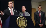  ?? TANIA BARRICKLO — DAILY FREEMAN FILE ?? MARCH 22: Gov. Andrew Cuomo, at the state police barracks in the town of Ulster, announces the arrest of William Sullivan, 21, of Saugerties, for an alleged antiSemiti­c incident at Mother Earth’s Storehouse in Ulster.