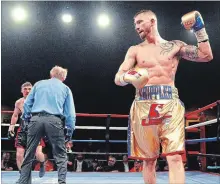  ?? CLIFFORD SKARSTEDT/EXAMINER FILE PHOTO ?? Cody Crowley knocks opponent Kevin Higson to the mat at the Memorial Centre on May 5. Crowley returns to the ring Saturday in Belleville.