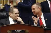  ?? PATRICK SEMANSKY — THE ASSOCIATED PRESS ?? House Judiciary Committee Chairman Jerrold Nadler, D-N.Y., left, speaks with Rep. Doug Collins, R-Ga., the committee’s ranking member, before a markup hearing on a series of bills, including some to reduce gun violence, on Tuesday.