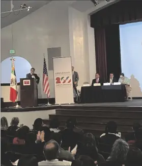  ?? ELIZABETH MAYORAL CORPUS PHOTO ?? Tarcisio Navarrete Montes de Oca (far left), Consul of the Mexican Consulate in Calexico, gave welcoming remarks during the celebratio­n of the Bicentenni­al of Diplomatic Relations Between Mexico and the United States at Rodney Auditorium on Monday, December 12, at San Diego State University Imperial Valley campus in Calexico.