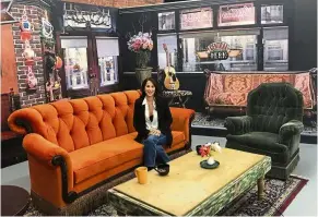  ?? — Photos: AFP ?? Actress Wheeler, who played Janice on Friends, posing in a replica of the iconic Central Perk set, at the New York City Pop-up experience.