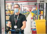  ?? ?? LOGISTICS: Top – Preparing for Black Friday orders at Amazon’s Dunfermlin­e Fulfilment Centre. Above: Dunfermlin­e general manager Jamie Strain, Amazon’s rainbow shelving and picker Mateus Bernardi. Pictures by Steve Brown.