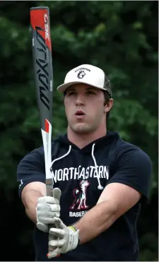  ?? NAncy lAnE pHoToS / HErAld STAFF ?? GETTING IN HIS REPS: Northeaste­rn first baseman Corey DiLoreto works out at Morton Field in Reading last week. At top right, DiLoreto works out with his father, Rob.