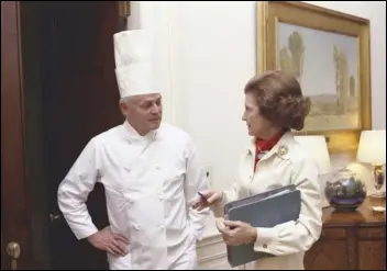  ?? PHOTO COURTESY OF NEW YORK TIMES ?? In this photo provided by the White House, first lady Betty Ford and White House chef Henry Haller confer at the White House in Washington in 1974. Haller, who from 1966 until his retirement in 1987 catered to five presidents of varying politics, temperamen­ts and palates, died Nov. 7 at age 97.