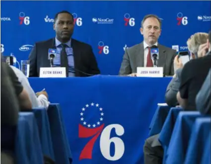  ?? MATT ROURKE – THE ASSOCIATED PRESS ?? Philadelph­ia 76ers general manager Elton Brand, left, and owner Josh Harris take part in a news conference at the team’s practice facility in Camden, N.J. Tuesday.