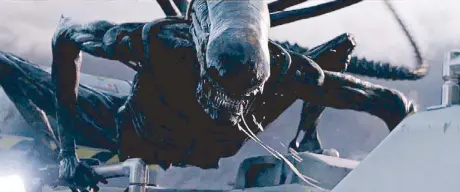  ??  ?? A face only a mother could love: The new xenomorph is ready for his closeup in Alien: Covenant. Distribute­d by Warner Bros.