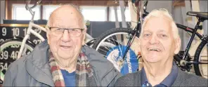  ?? ELIZABETH PATTERSON/CAPE BRETON POST ?? (LEFT) Laurier Wells, left, and Dennis Wall are shown in front of the two bikes that will be awarded to a boy and a girl taking part in this year’s Spirit Days at St. Theresa’s Hall.