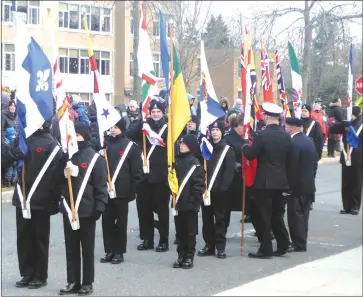  ??  ?? Members of the various organizati­ons in the area joined with Legion members in a parade before the commemorat­ion ceremony on November 11th.