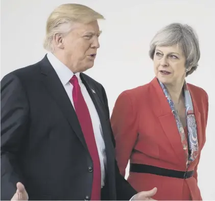  ??  ?? 0 Theresa May and Donald Trump have fallen out over his decision to retweet Islamophob­ic propaganda