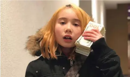  ?? ?? Lil Tay, who rose to viral fame as a foul-mouthed nine-year-old on Instagram. Photograph: Lil Tay/Instagram