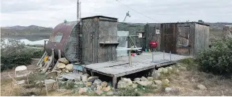  ??  ?? Hundeso Hunting Cabin, one of nine huts along the trail, sits south of the Aasivissui­t-Nipisat Inuit Hunting Ground.