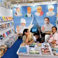  ?? PTI ?? Books displayed at a stall in the Delhi Book Fair in New Delhi. —