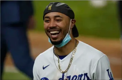  ?? AP Photo/Eric Gay ?? Los Angeles Dodgers right fielder Mookie Betts celebrates after defeating the Tampa Bay Rays 3-1 to win the baseball World Series in Game 6 on Oct. 27 in Arlington, Texas.