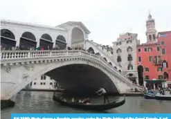  ??  ?? SALZANO: Photo shows a Gondola passing under the Rialto bridge at the Canal Grande. A referendum held on October 22, 2017 in the Italian regions of Lombardy and Veneto asked for more fiscal autonomy and more powers to decide how to allocate financial...