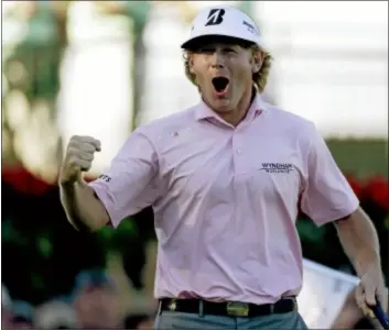  ?? AP Photo ?? Brandt Snedeker reacts after sinking his putt on the 18th hole to win the Tour Championsh­ip and the FedEx Cup on Sunday.