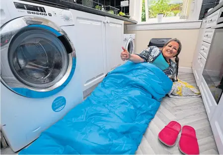  ??  ?? Lynne Short is preparing to spend a night sleeping on her kitchen floor.