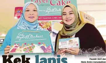  ??  ?? Fauziah (kiri) dan Haniz Amira menunjukka­n
produk MyZiff Bakers.