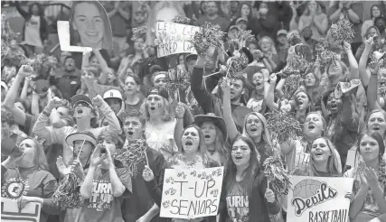  ?? CHRIS TODD ?? Booneville fans cheer for their Blue Devils at the MHSAA Class 3A Basketball State Championsh­ips on March 5 at the Mississipp­i Coliseum in downtown Jackson, Miss.