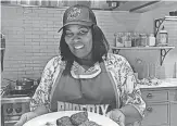  ?? COURTESY OF FOX RESTAURANT CONCEPTS ?? Suns center Deandre Ayton’s mom, Andrea Ayton, is all smiles over her sea bass dish being part of a Fox Restaurant Concepts menu to assist Helping Hands for Single Moms.