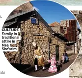  ?? ?? CULTURE Family in traditiona­l attire in Mea She’arim